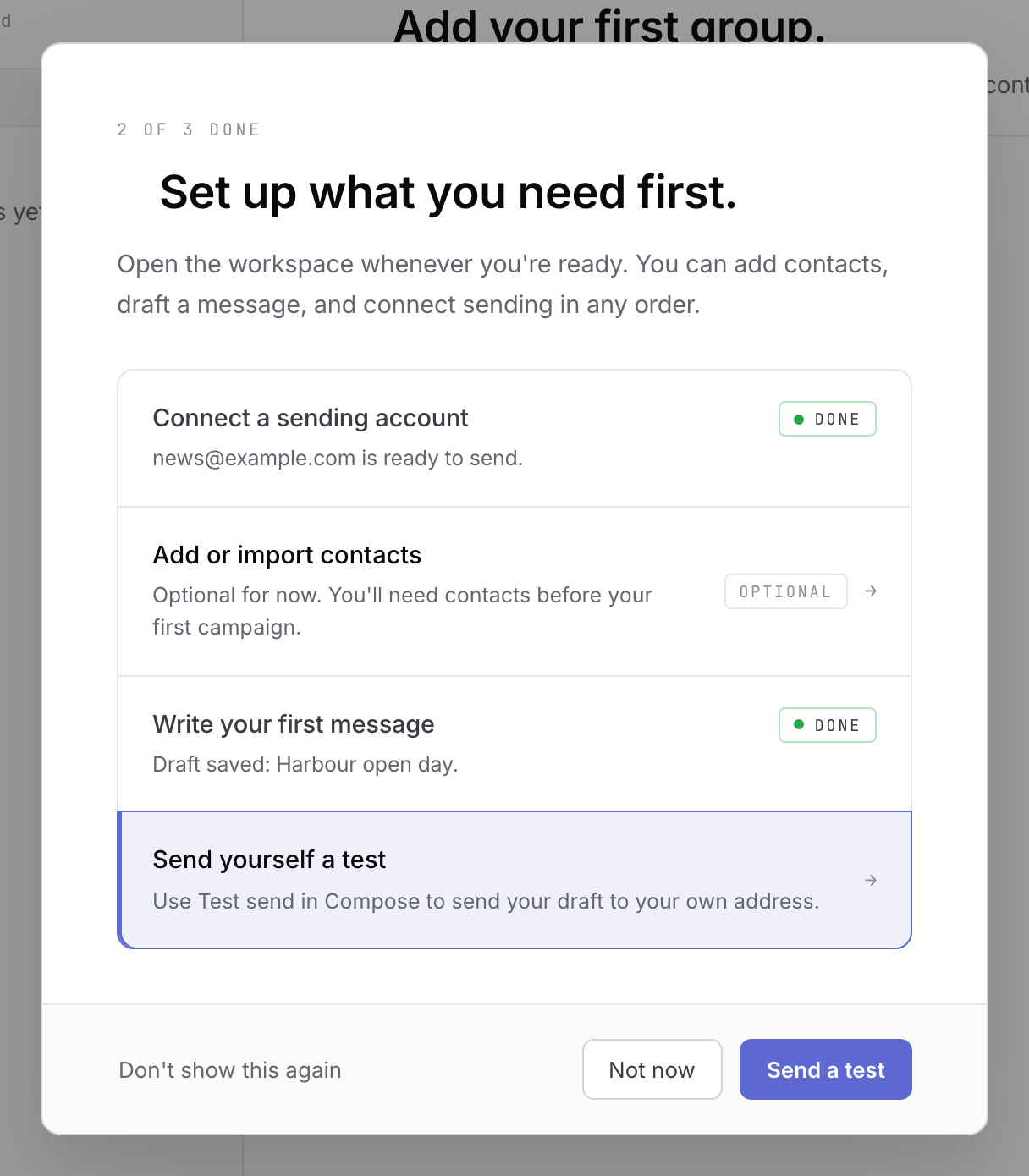 Checklist showing 2 of 3 done, with a fictional ready sending account and saved draft, and Send a test.