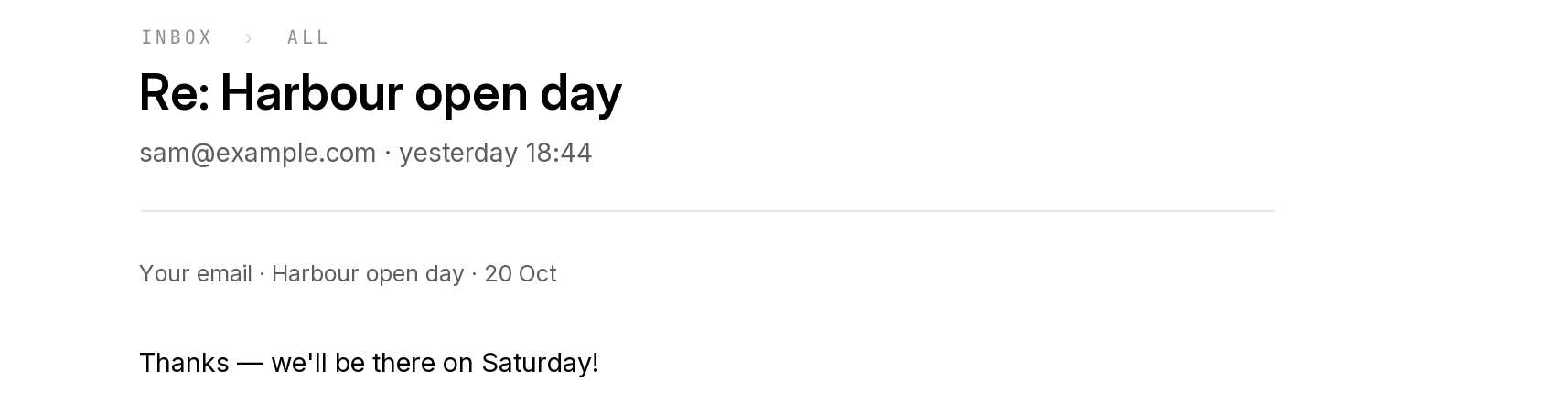 A reply in Inbox with its subject, sender and time, the line naming the Groupmail email it answers, and the reply text.